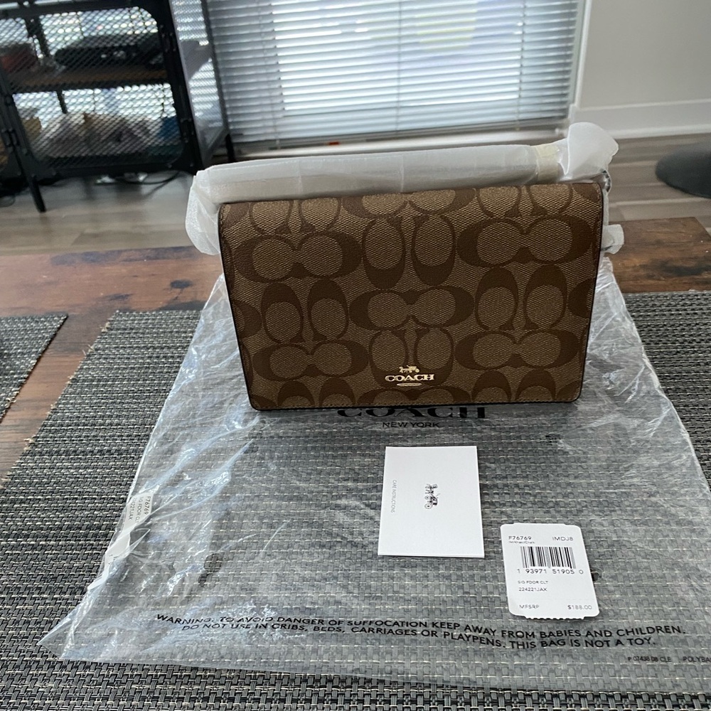 Coach Anna foldover, khaki/chalk, Sig, NWT, on original packaging. Leather trim.